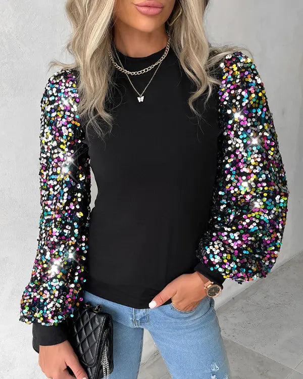 Fashionable black sequin top for women, featuring trendy balloon sleeves, perfect for a chic and versatile look.