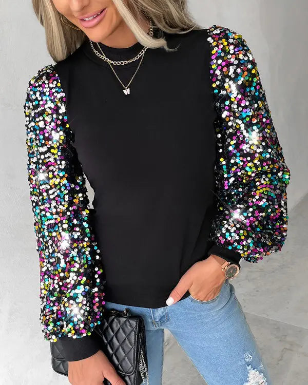 Elegant women's black long-sleeve balloon blouse with sequin embellishments, ideal for office wear & chic casual.