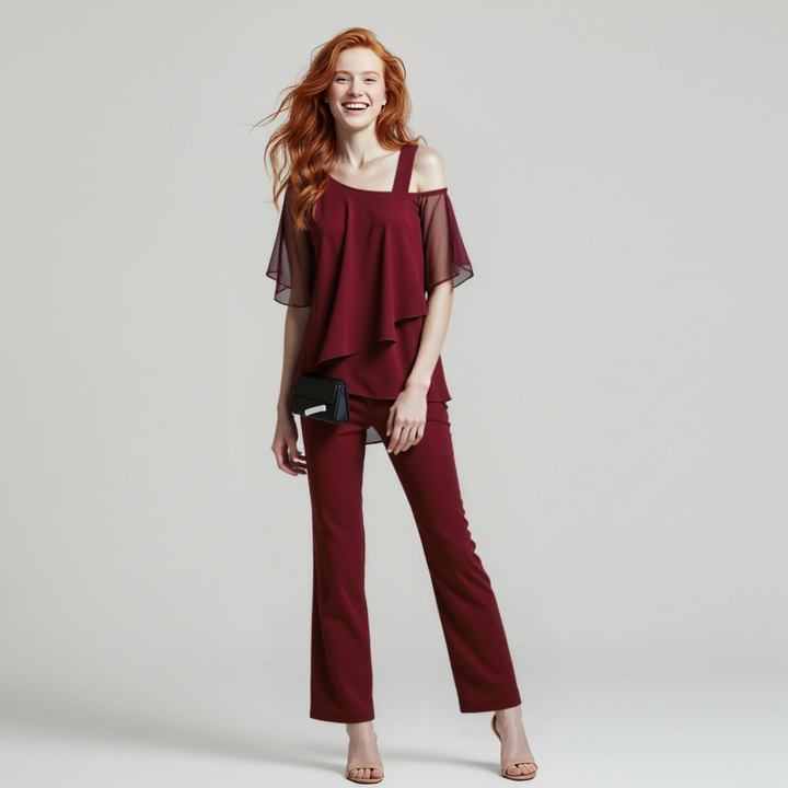 Modern dark blue women's two-piece set with a draped design & flowy wide-leg pants, ideal for comfort.