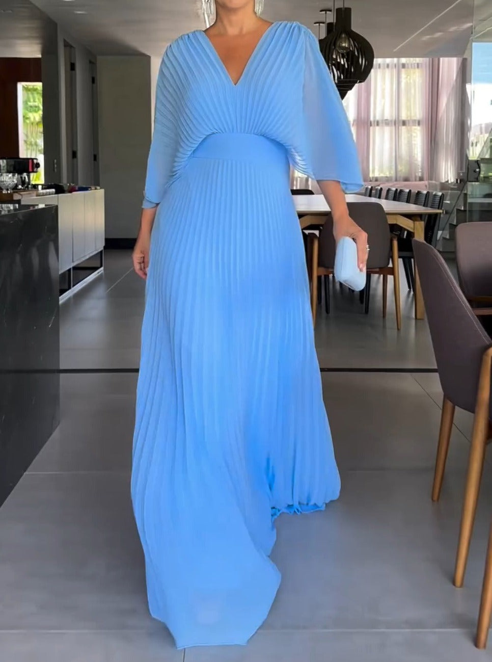 Elegant women's floral V-neck maxi dress, perfect for summer fashion or casual beachwear.