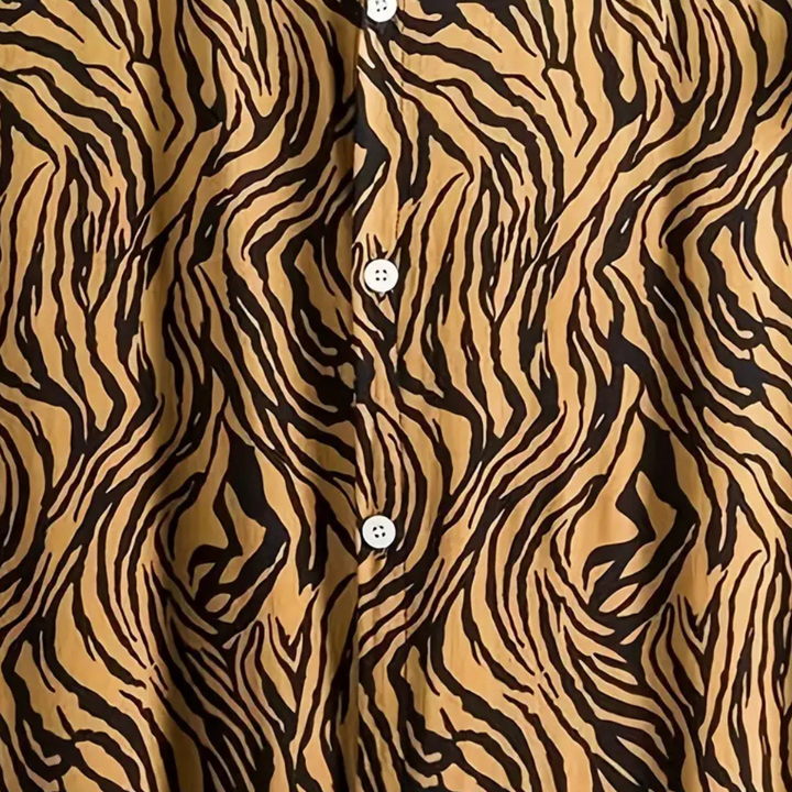 Unique men's tiger print short sleeve shirt, relaxed fit for weekend style. Casual button-front fashion.
