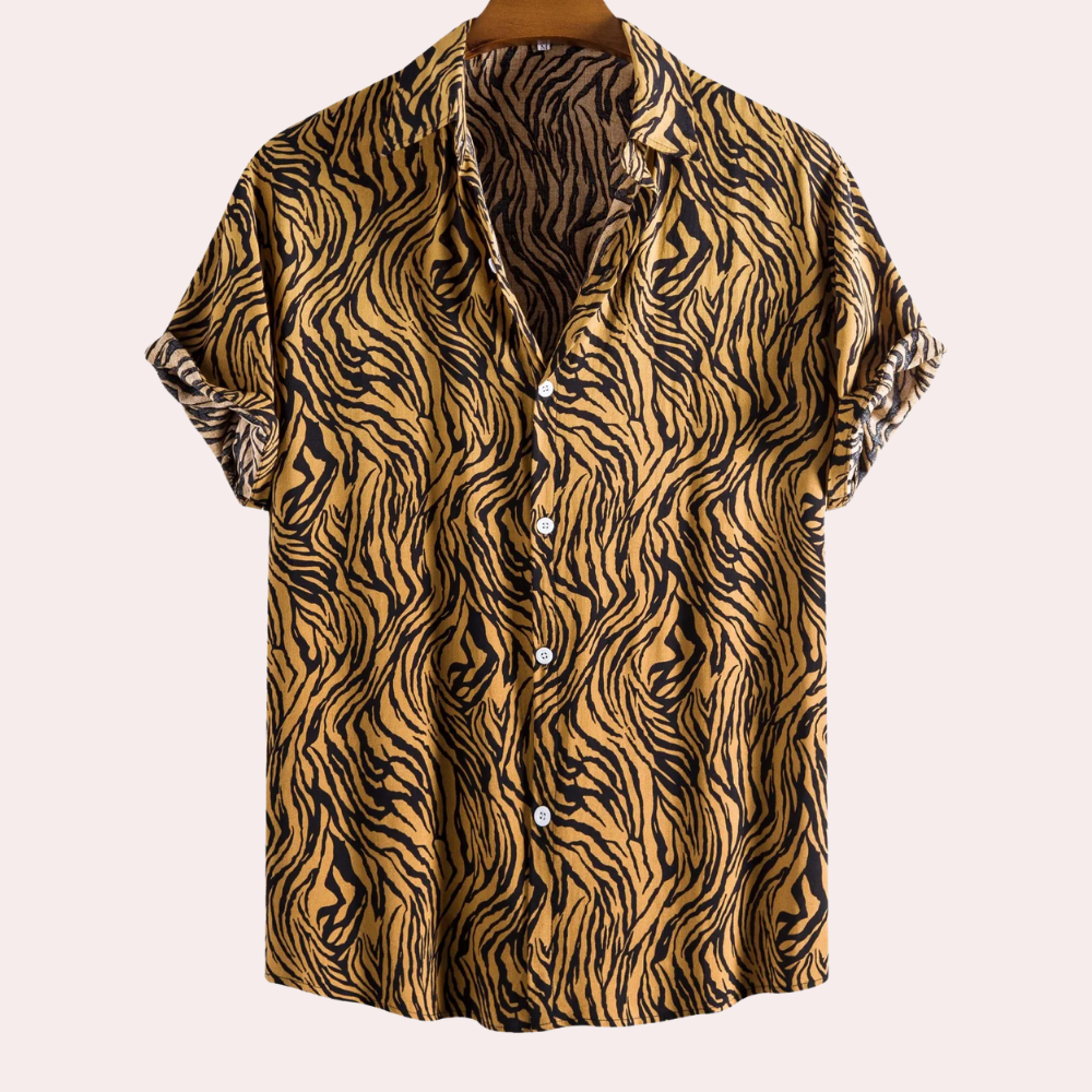 Men's relaxed fit short sleeve shirt with bold tiger print. Perfect for casual summer wear or vacation style.