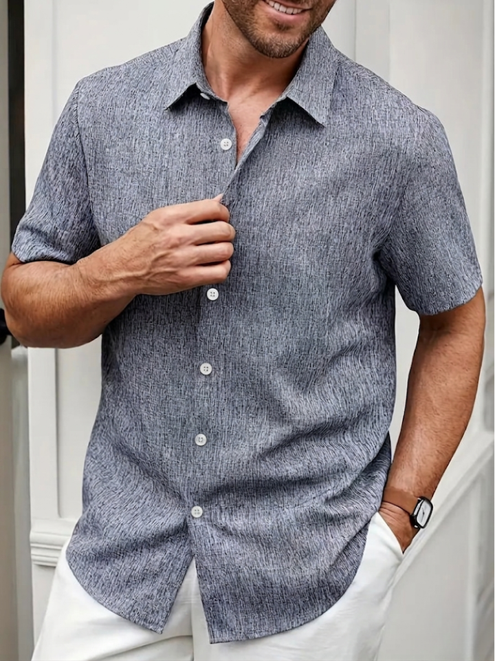 Comfortable men's relaxed fit short sleeve button-down shirt. Great for casual summer outings & everyday.