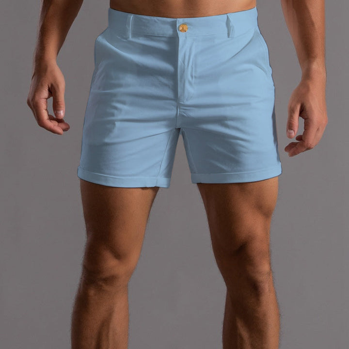 Pink men's stylish chino shorts, offering tailored fit & summer comfort. A modern fashion choice for everyday wear.
