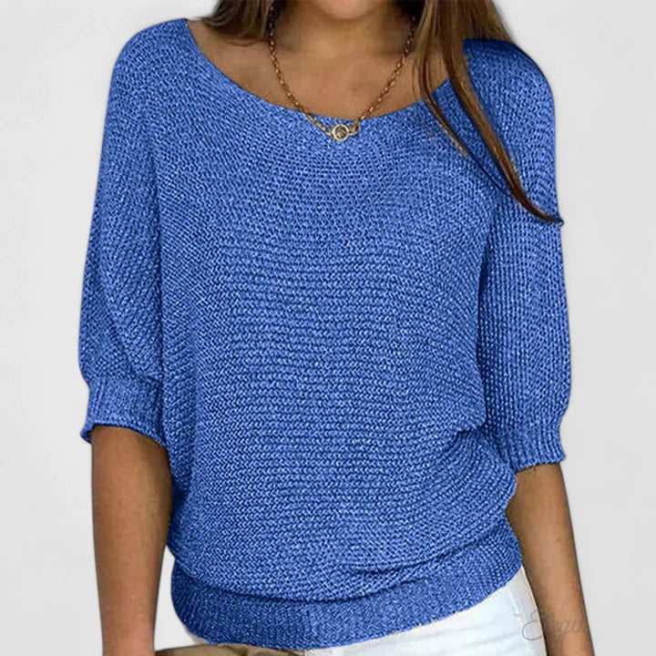 Women's comfortable knit pullover. Soft, long-sleeve jumper for stylish casual wear and warm winter fashion.