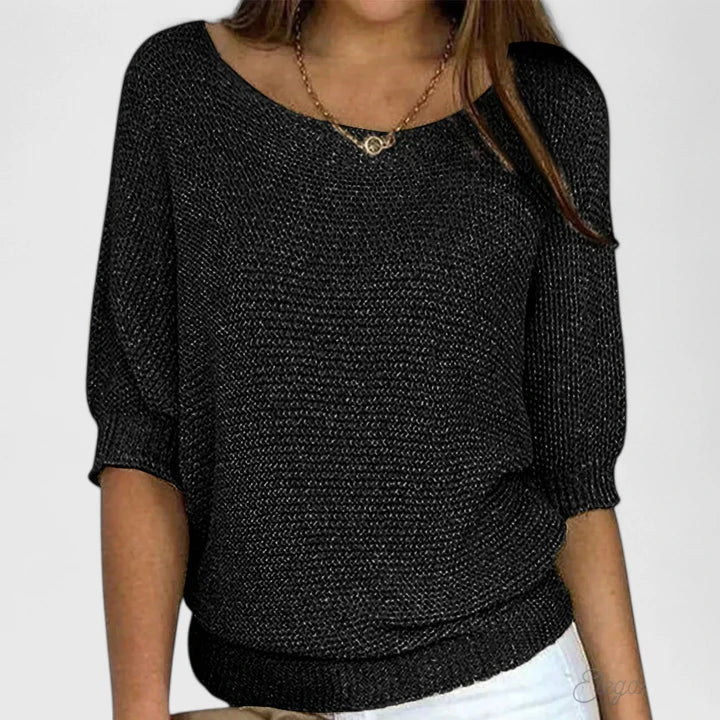 Elegant women's soft knit jumper. Versatile & comfortable long-sleeve pullover for stylish winter fashion.