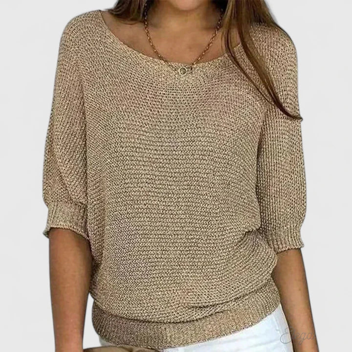 Soft knit women's jumper, comfortable long-sleeve pullover, perfect for casual winter fashion.