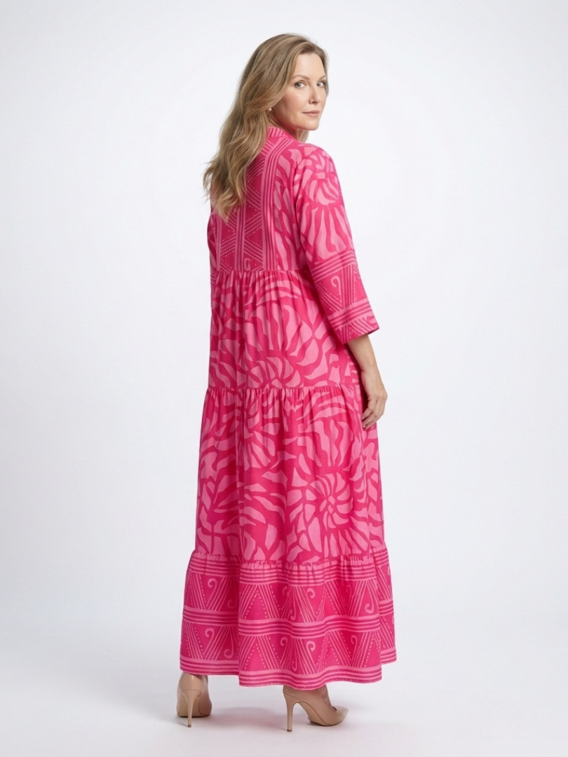 Relaxed fit women's midi dress with button front & elbow sleeves. Versatile for casual spring & travel.