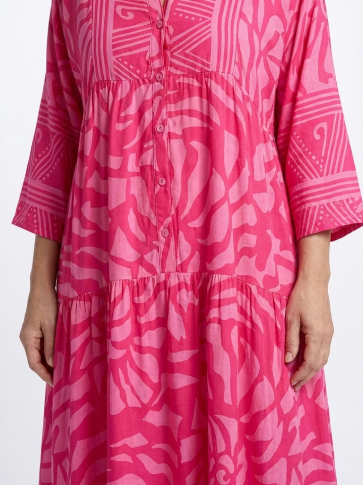 Chic casual button-front midi dress for women. Ideal spring/summer outfit, travel wear, & relaxed style.