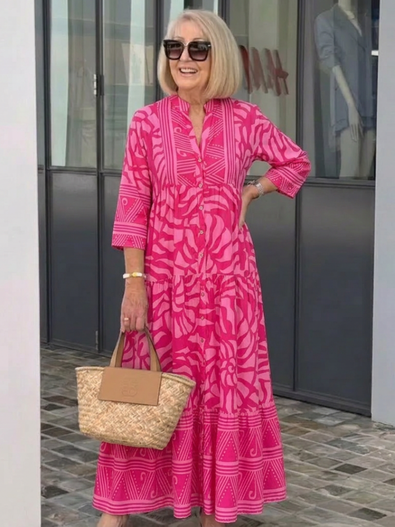Vibrant women's midi dress, button-front design. Casual, chic, and relaxed fit for spring & summer.