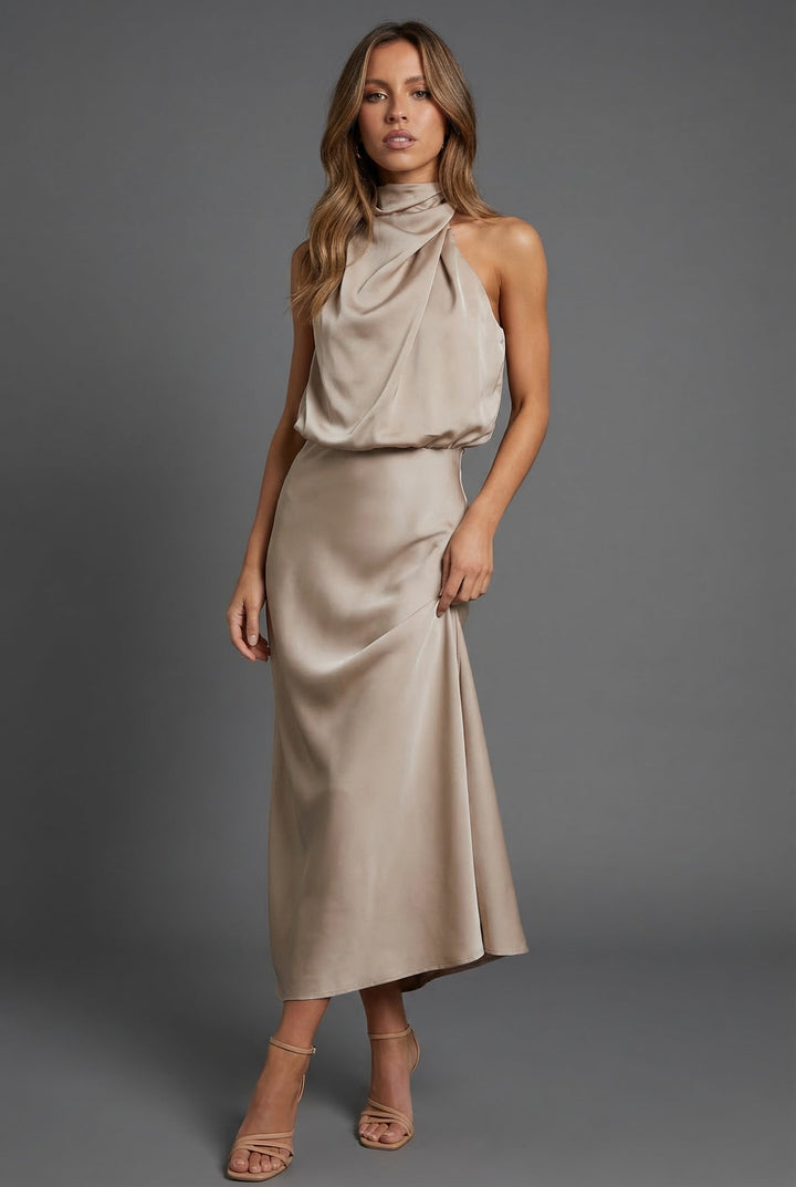 Chic open back halter neck midi dress, perfect for wedding guests & summer parties.