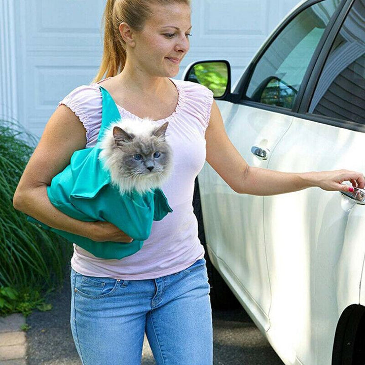 Durable & breathable cat travel bag, designed for secure and comfortable transport of felines. Essential pet supplies.