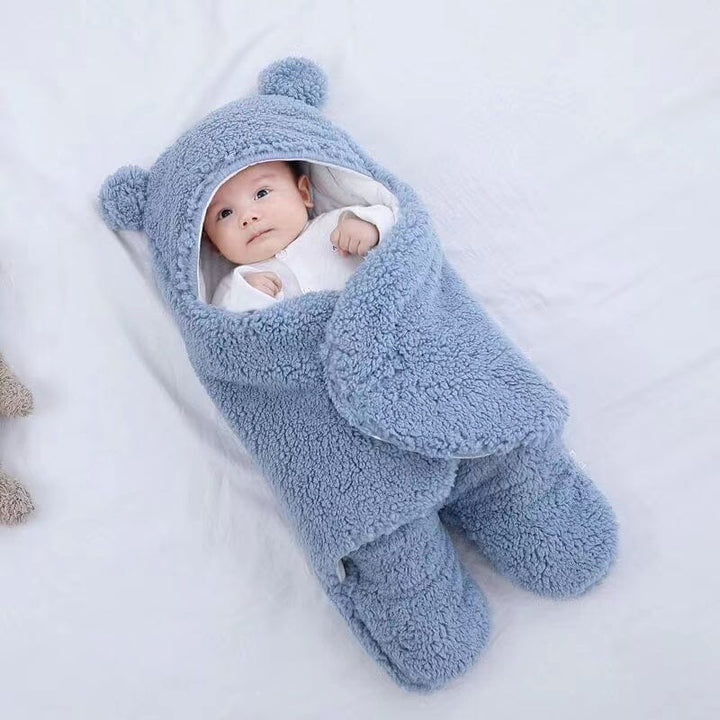 Cute bear ear quilted winter swaddle & sleeping bag, keeping baby warm in soft cotton. Newborn essential.