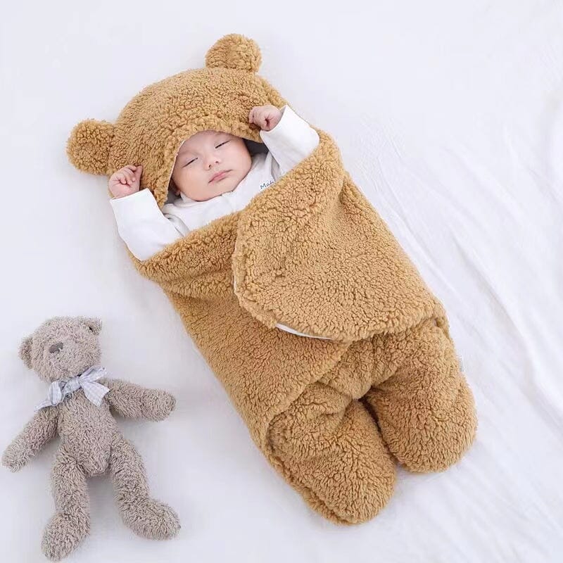 Versatile baby bear ear quilted swaddle and sleeping bag. Ultra soft cotton for warm, cozy winter sleep.