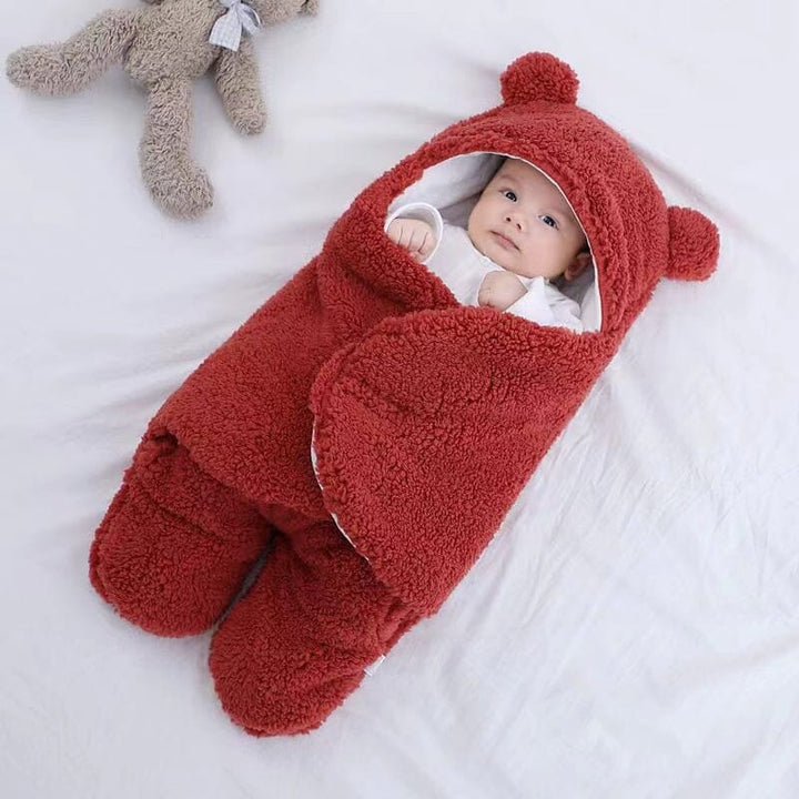 Stylish unisex bear ear quilted winter swaddle. Ultra soft cotton sleeping bag provides cozy comfort for baby.