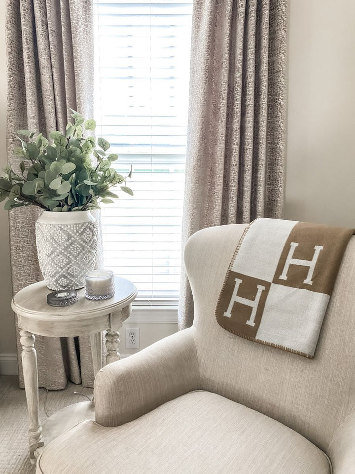 Cozy wool cashmere throw blanket, warm and plush, ideal for luxury home decor.