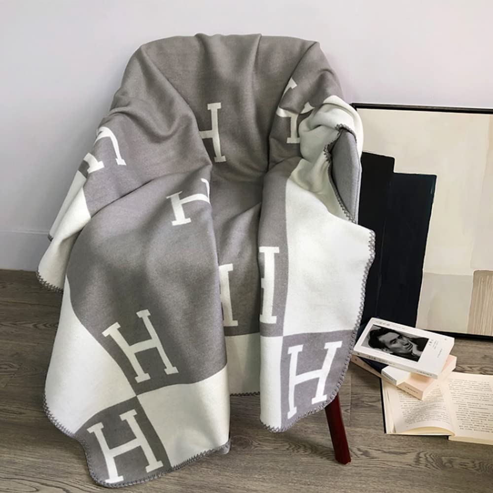 Plush wool cashmere throw blanket, ultra soft & warm comfort for any home space.