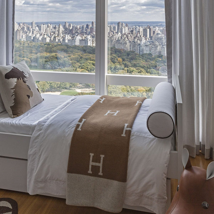 Plush wool cashmere throw blanket for a cozy living room or bedroom accent, ultra soft.