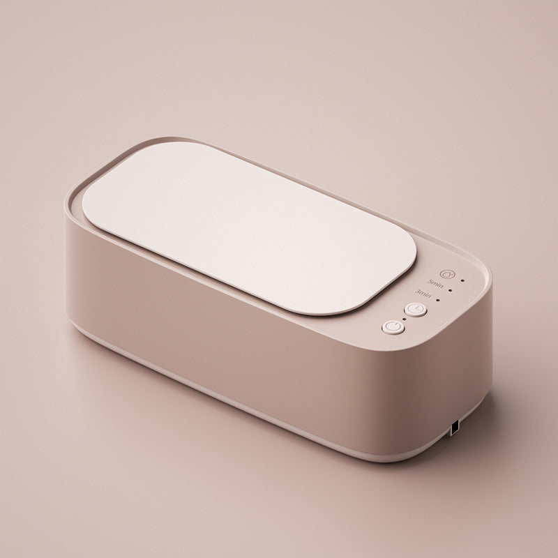 "Ultrasonic cleaning device restoring shine to jewellery, glasses, watches with advanced sound wave technology."
