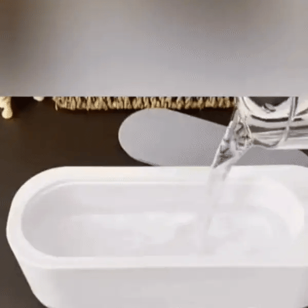 "Ultrasonic cleaning device restoring shine to jewellery, glasses, watches with advanced sound wave technology."