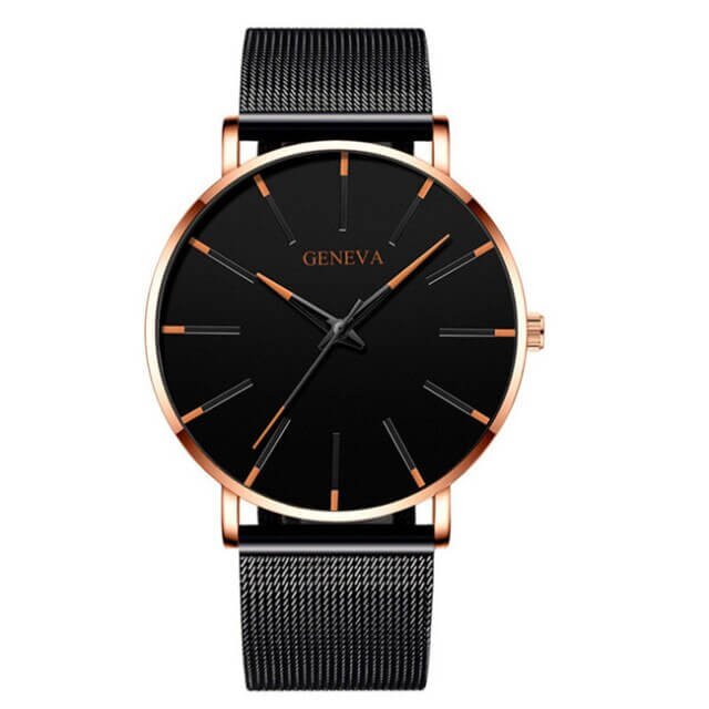 Minimalist men's ultra-thin watch, featuring a polished case and a comfortable leather strap.