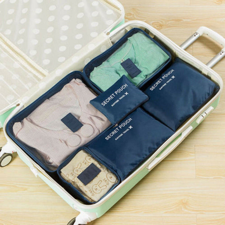 Full view of two 6-piece travel organizer sets; space-saving luggage bags.