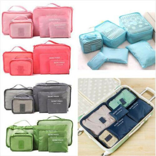 Open luggage with perfectly arranged 12-piece packing cubes, travel organizer set.