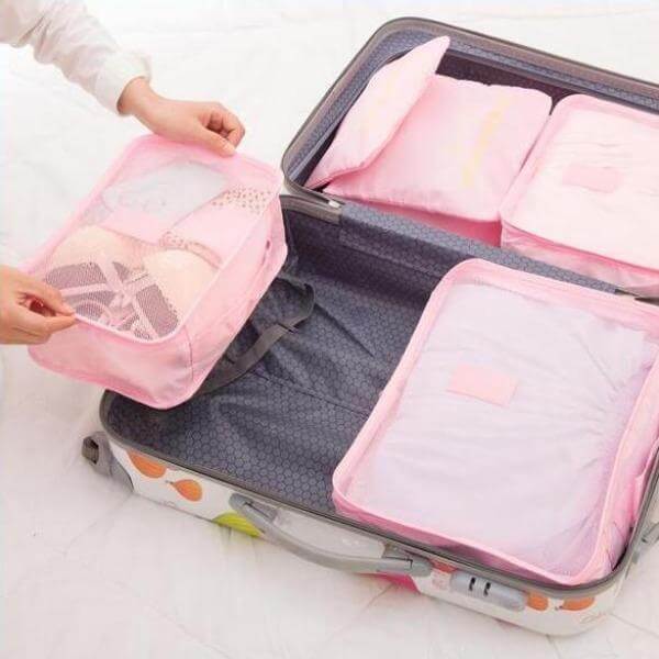 Unisex travel storage solution: 12 versatile packing bags for efficient luggage use.