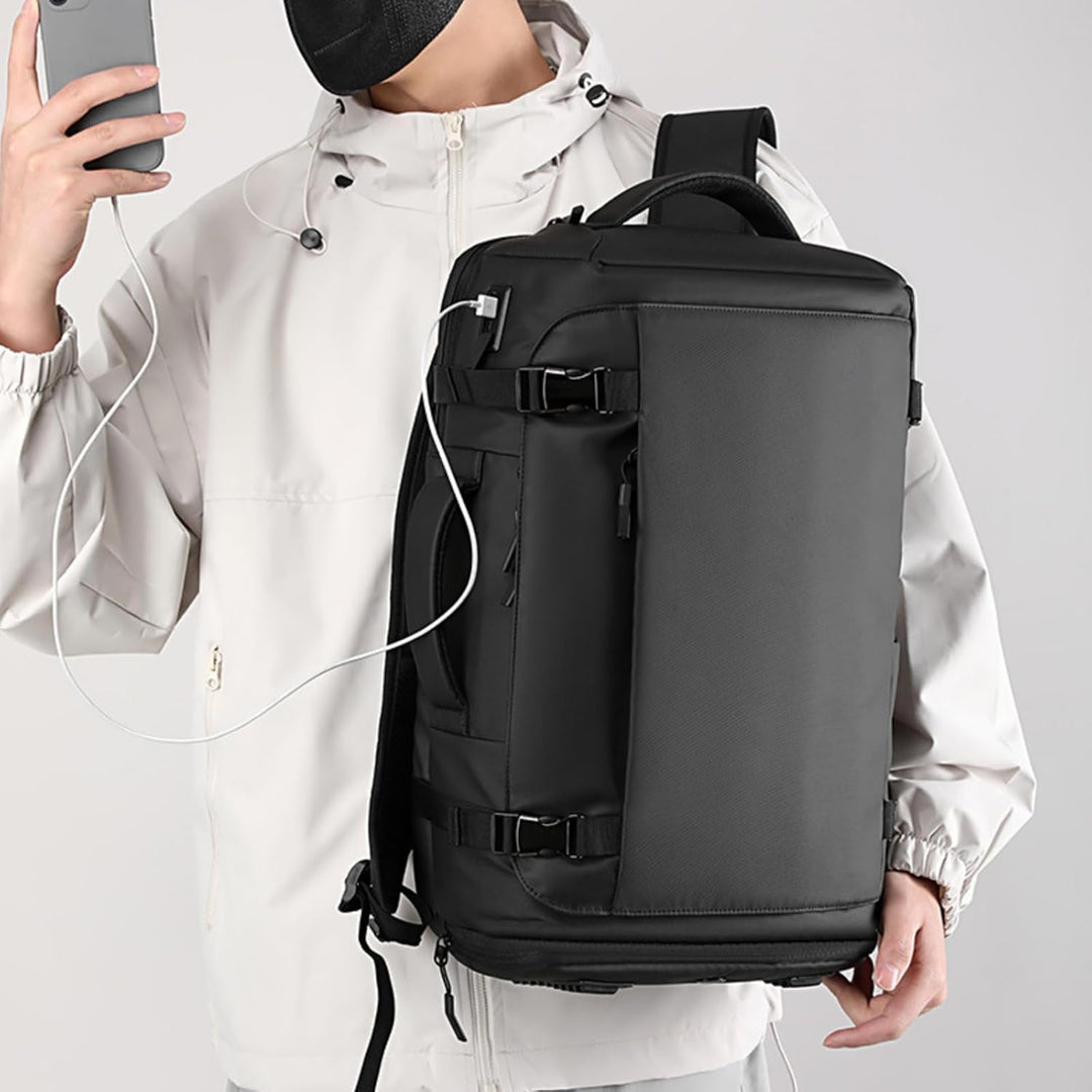 Sleek unisex 15" laptop backpack. Side-open access, multiple compartments, built-in USB-C port for charging.