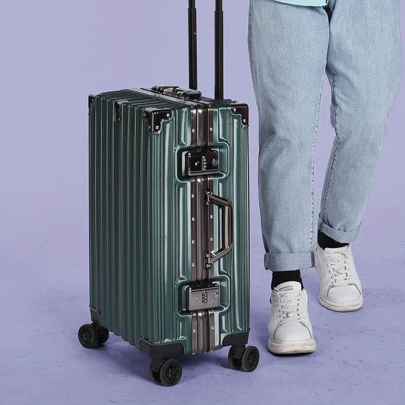 Durable aluminum frame hard shell checked bag. Secure rolling travel suitcase for long journeys.