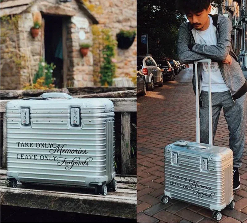 Sleek silver aluminum hardshell luggage, durable and secure for business or vacation travel.