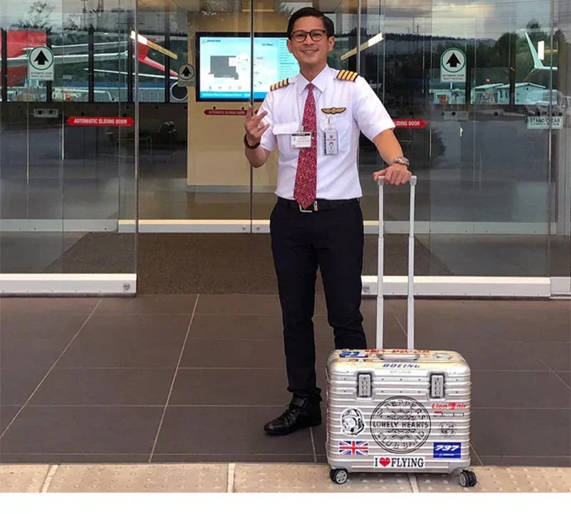 Spacious interior of aluminum hardshell suitcase, organized for secure and efficient packing.
