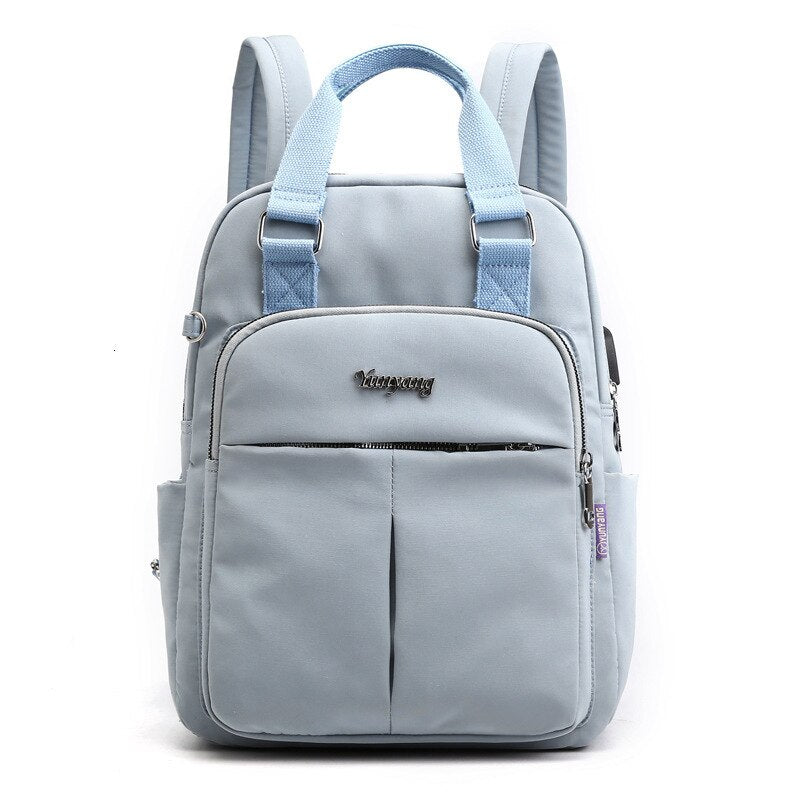 Sleek water-resistant anti-theft backpack, featuring hidden zippers & USB charging for secure travel.