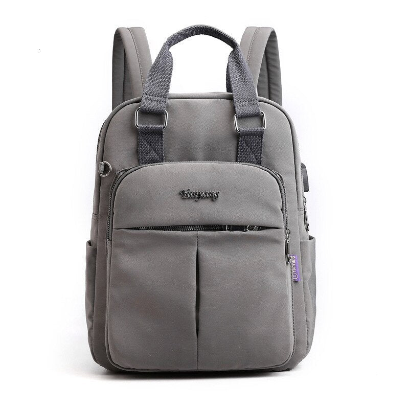 Spacious multi-compartment anti-theft backpack, perfect for organizing essentials & 15-inch laptops.