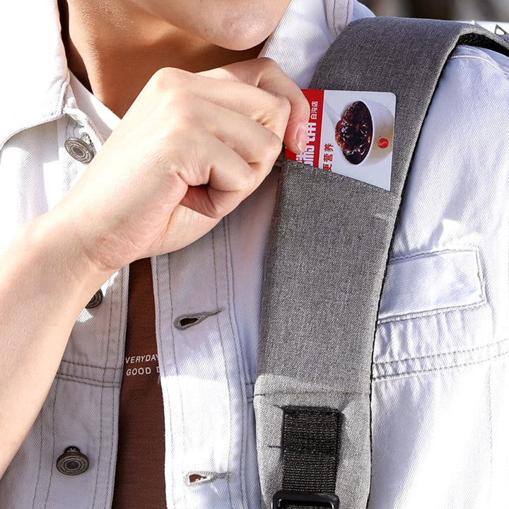 Detail of the SafeCarry anti-theft backpack's durable water-resistant material, protecting electronics from rain.