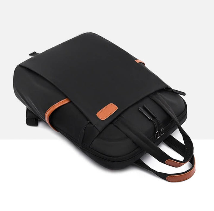 Stylish unisex anti-theft backpack, water-resistant Oxford material for secure travel & daily use.
