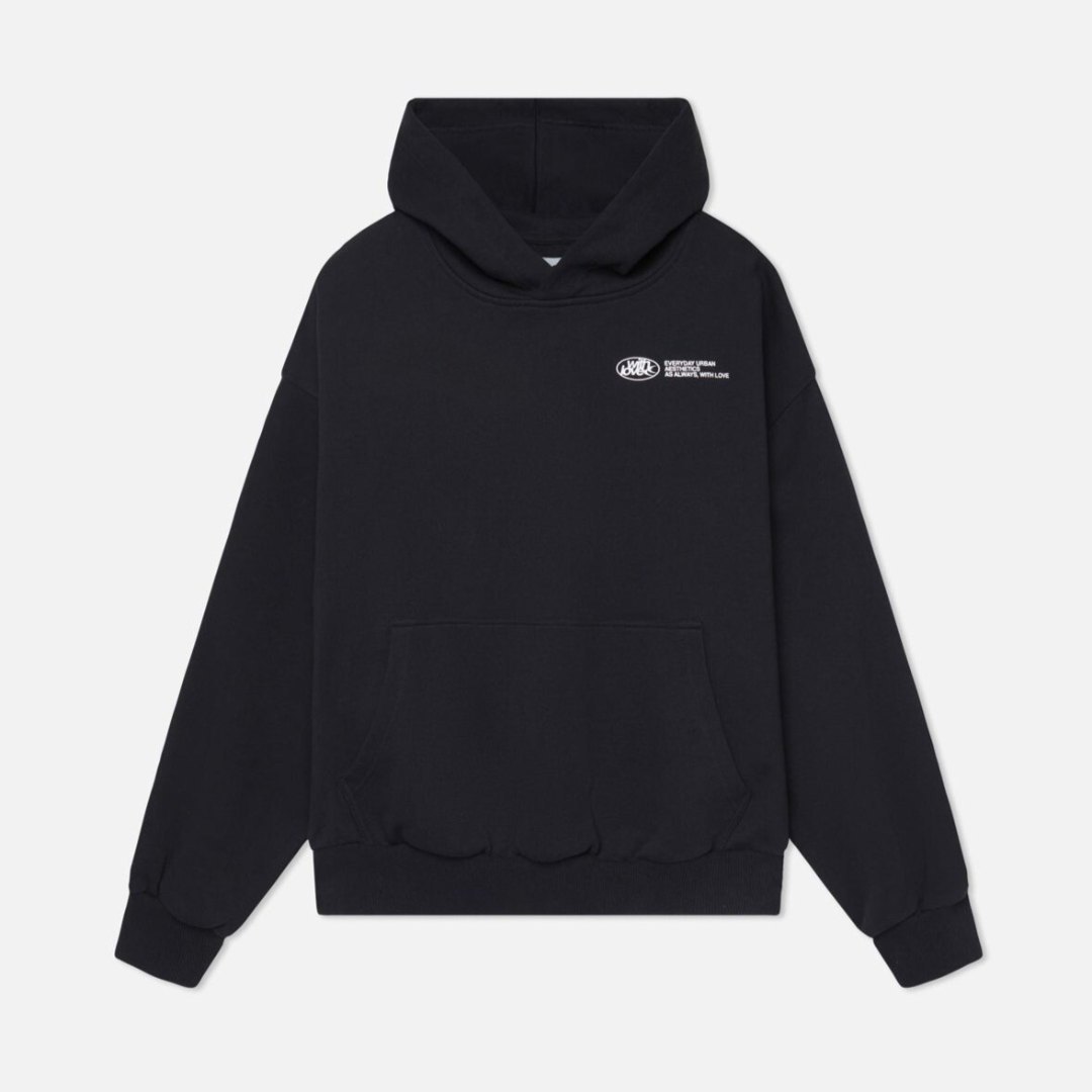 Model wearing a comfortable unisex classic pullover hoodie in a casual, everyday setting.