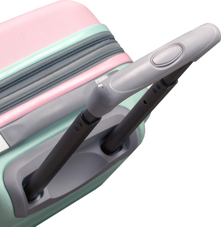 Compact Cotton Candy expandable hardside carry-on luggage. Double spinner wheels for easy movement.