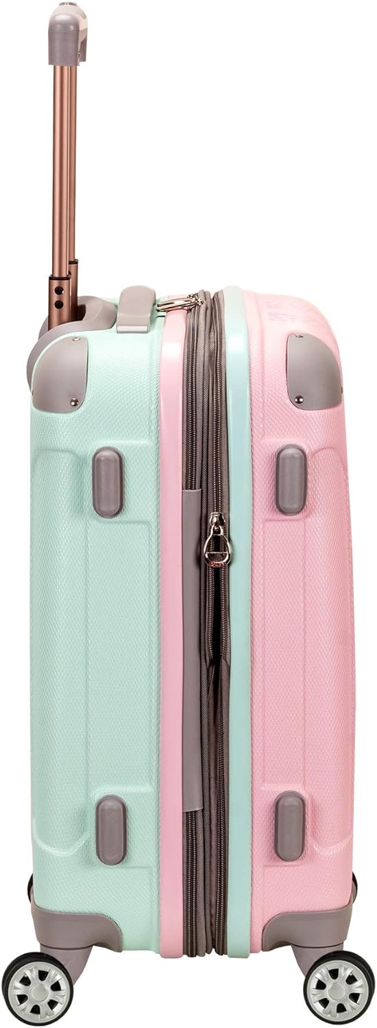 Lightweight Cotton Candy expandable hardside carry-on suitcase with double spinner wheels.