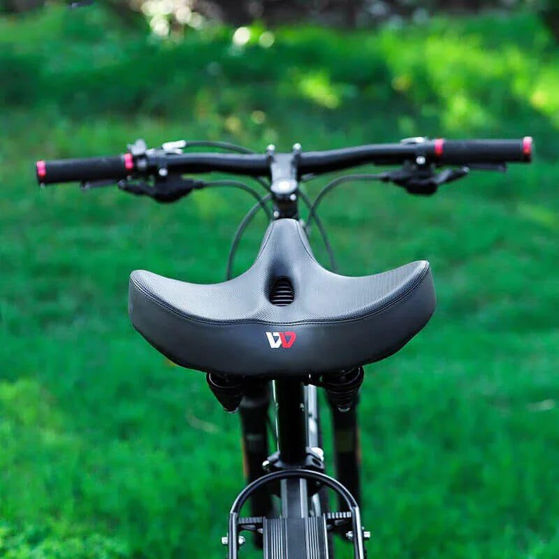 Plush, extra-padded wide ergonomic bicycle saddle ensuring superior comfort for men and women cyclists.