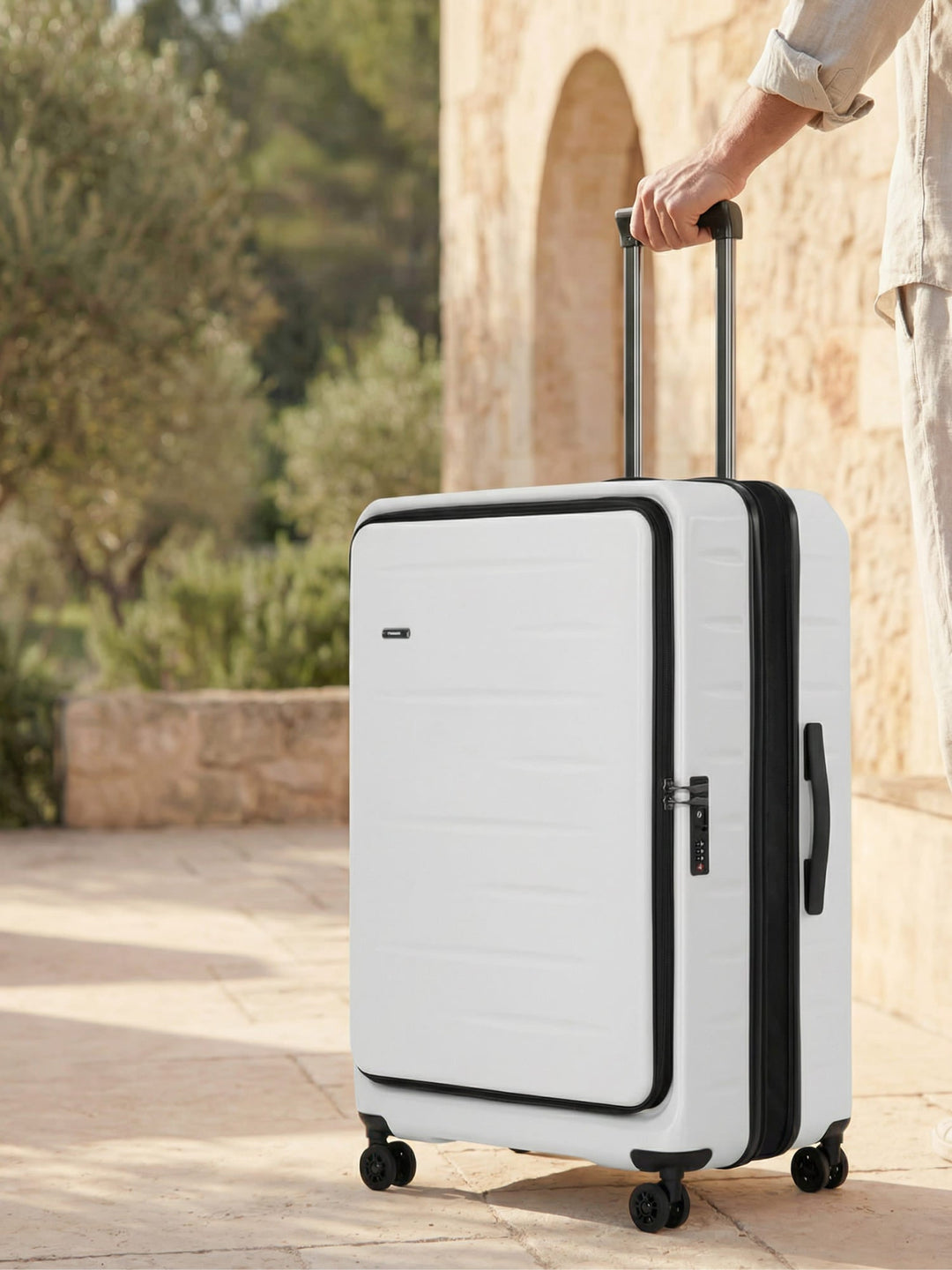 Durable hard shell carry-on luggage featuring a convenient front pocket & secure TSA lock.