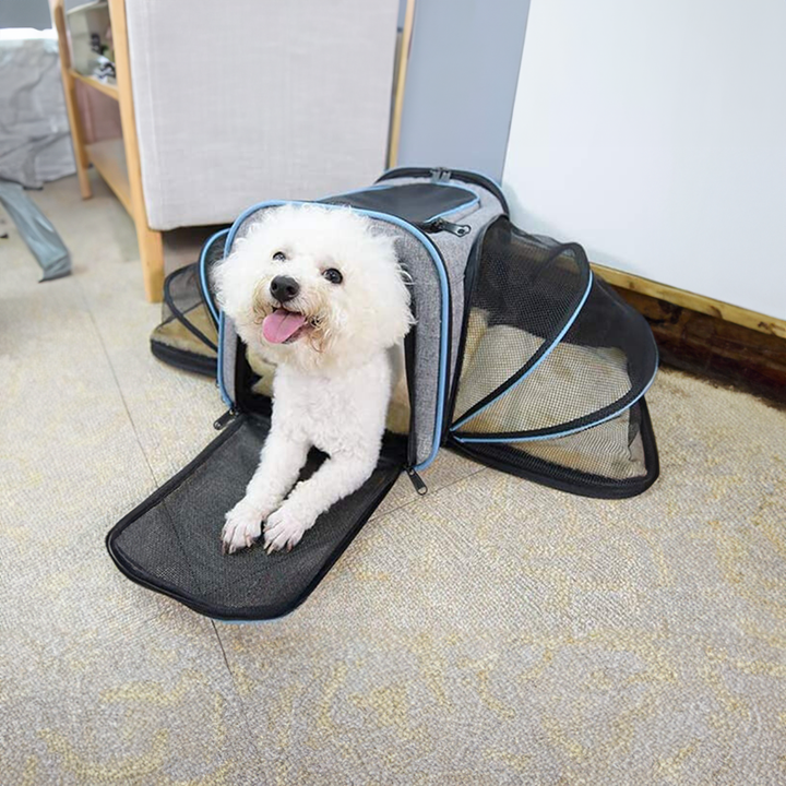 Unisex expandable pet travel carrier for dogs & cats. Soft-sided, breathable, and portable for comfortable journeys.
