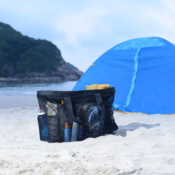 Spacious sandproof mesh carryall bag. Extra-large unisex beach tote with zipper, great for family outings.