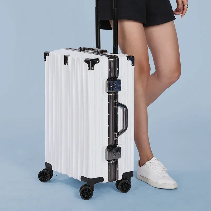 Robust hard shell suitcase featuring an aluminum frame & smooth spinner wheels for travel.
