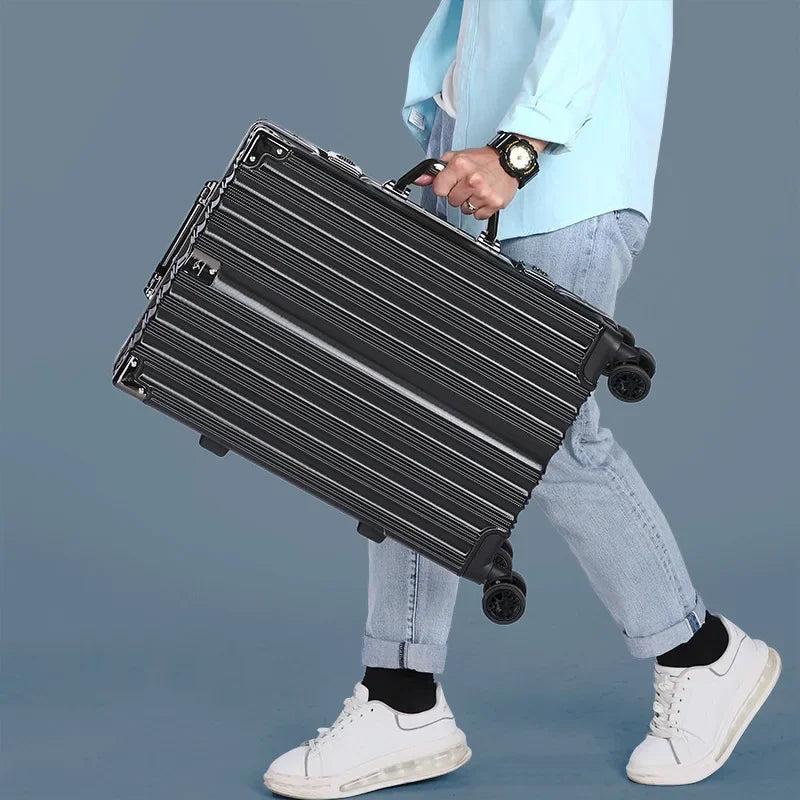 Unisex travel bag, durable hard shell luggage with aluminum frame for secure journeys.