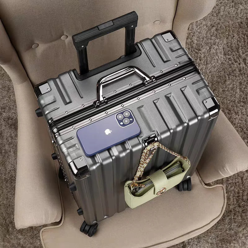 Modern unisex hard shell travel luggage with sleek aluminum frame & effortless spinner wheels.