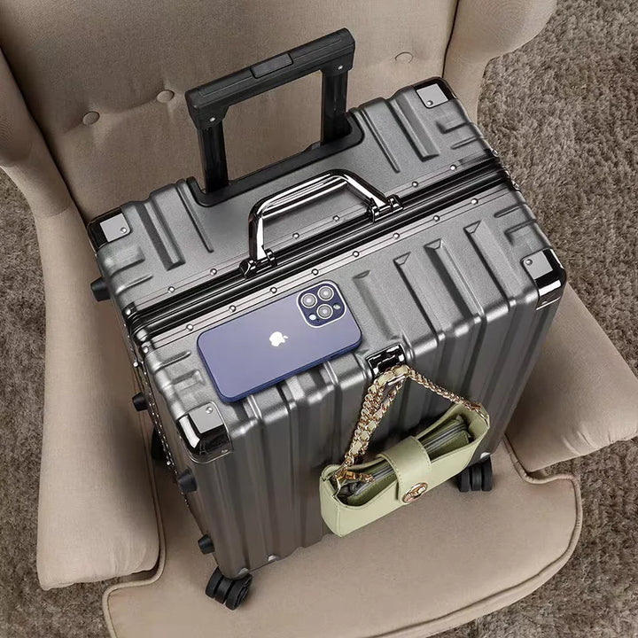Modern unisex hard shell travel luggage with sleek aluminum frame & effortless spinner wheels.