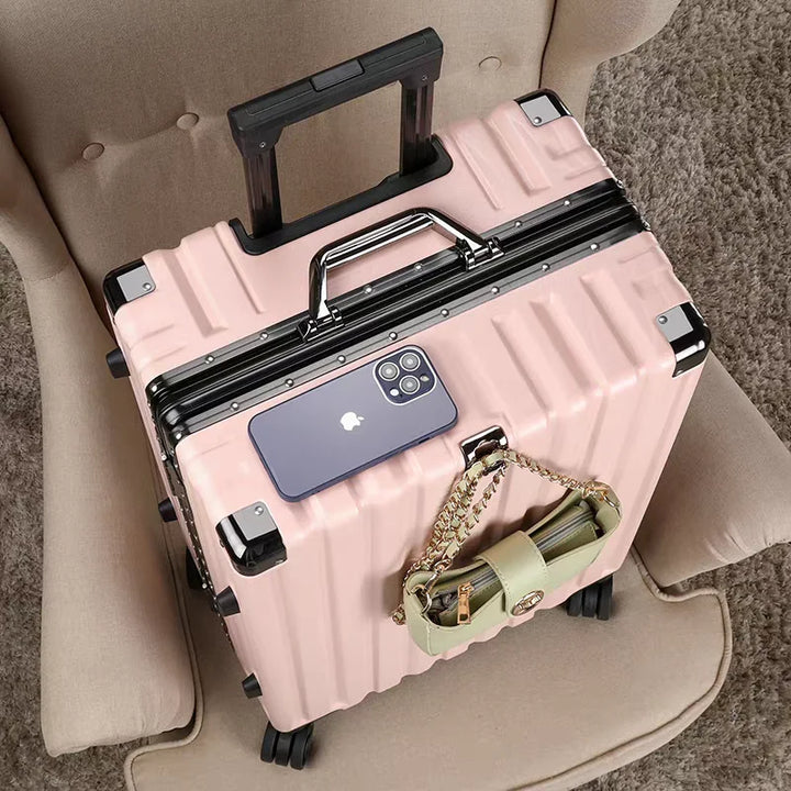 Easy-to-maneuver hard shell travel suitcase with aluminum frame & 360-degree spinner wheels.
