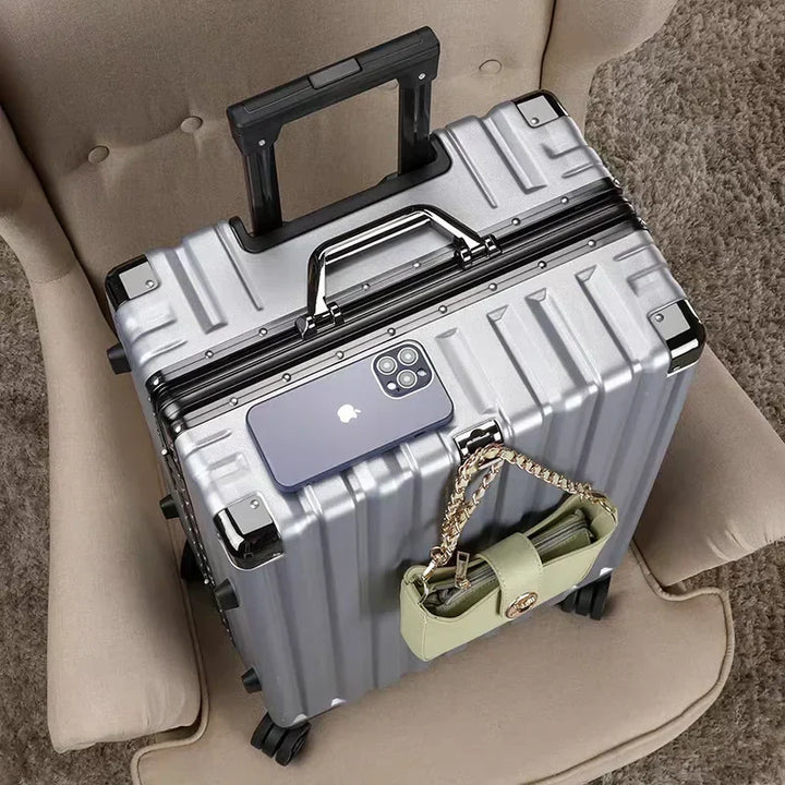 Spacious hard shell travel suitcase with aluminum frame, ideal for packing for any vacation.