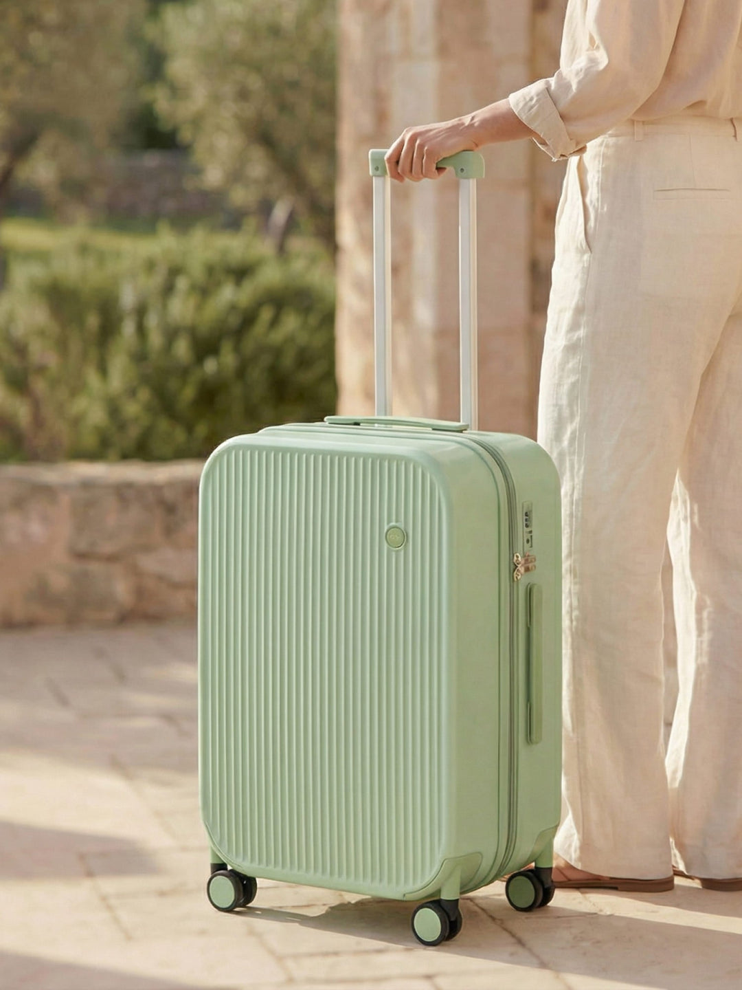 Durable hardshell luggage with spinner wheels, integrated cup and phone holders for easy travel.